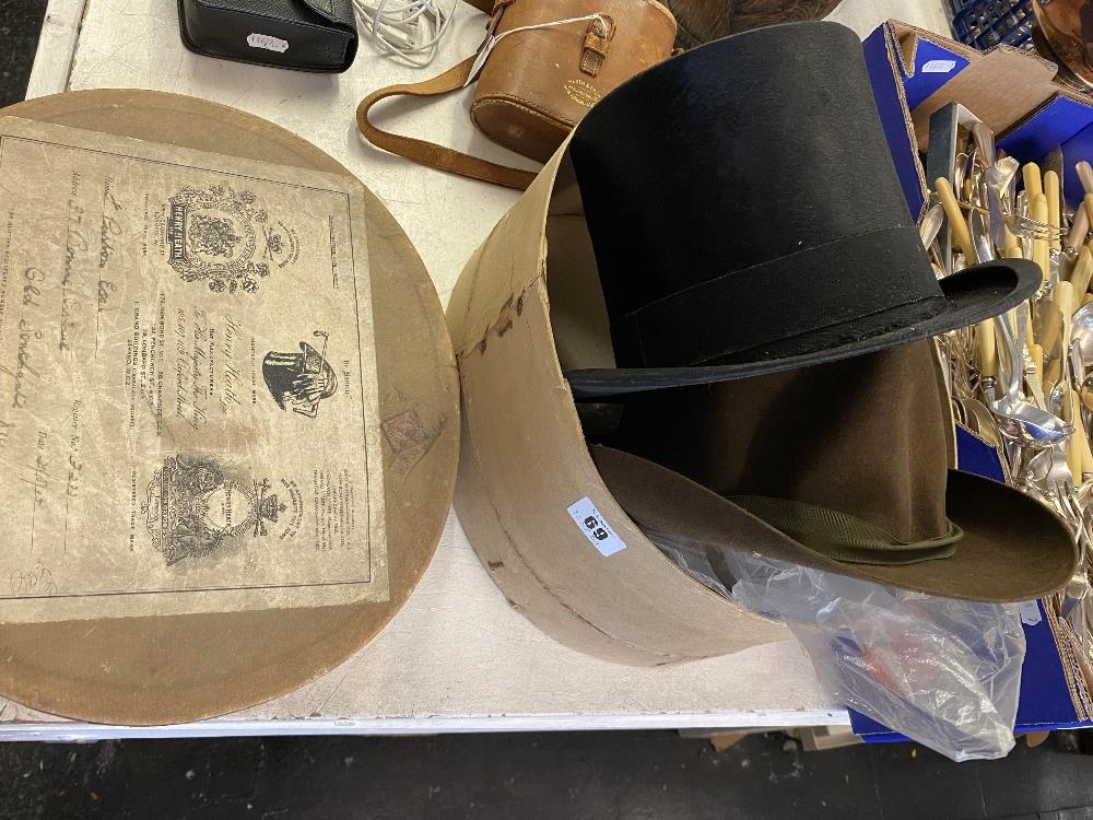 A Top Hat in a box and a trilby hat