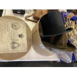 A Top Hat in a box and a trilby hat