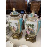 Two 19th century Porcelain and Ormulu vases, one lid a.