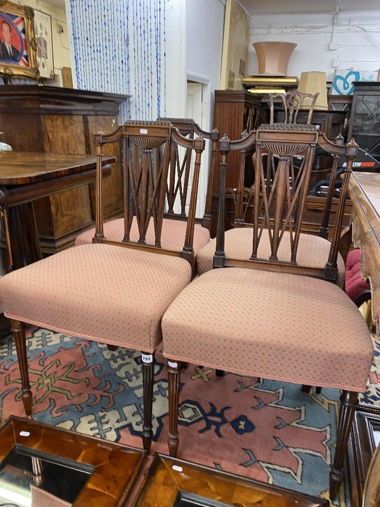 A set of four Mahogany dining chairs a.