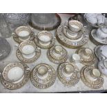 A Wedgewood part coffee/ soup set,white and gilt,