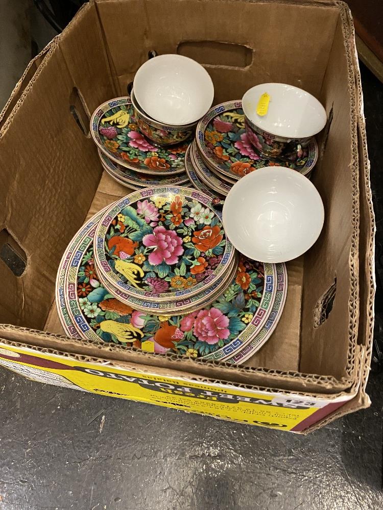 An oriental floral pattern tea set