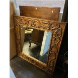 A carved decorative mirror