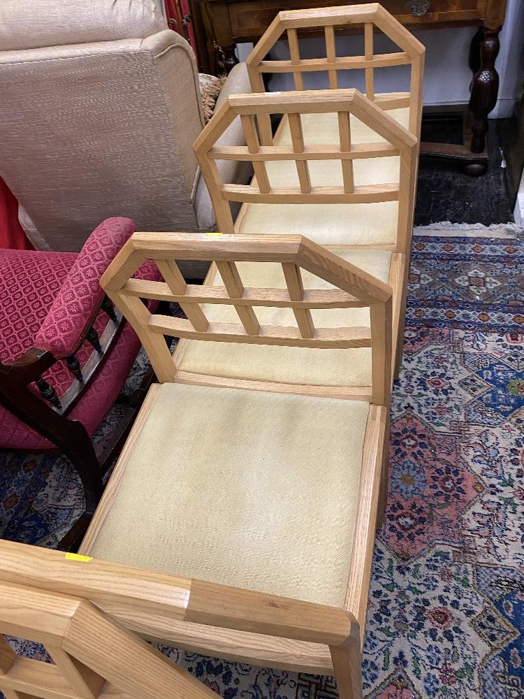 A set of eight Oak dining chairs