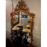 A decorative gilt mirror