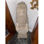 A stone garden figure of a Lion