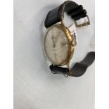 An Accurist 9ct GOld gents watch in working order