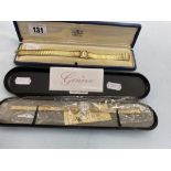 Two boxed ladies watches