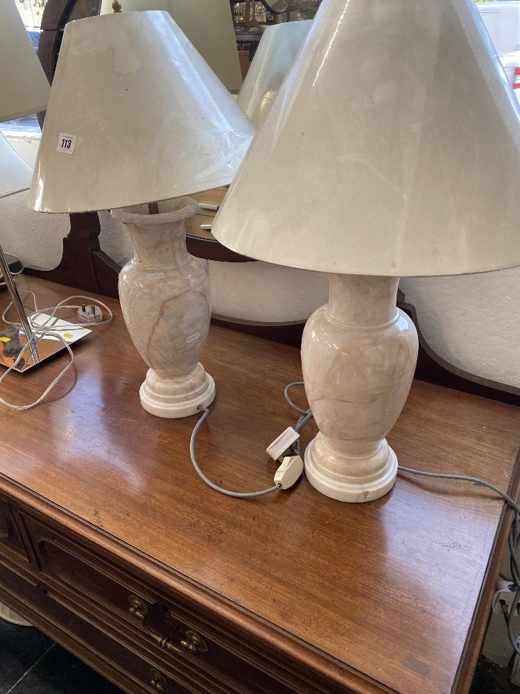 Pair of marble lamps and shades