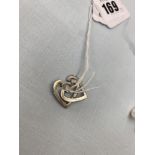 A pair of White Gold Diamond set Heart shaped earrings