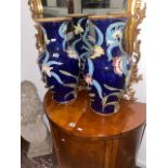 A pair of large decorative blue vases