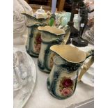 A set of three Victorian graduated jugs