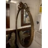 A large Oval gilt mirror