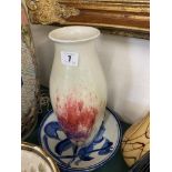 A monogrammed vase and a bowl