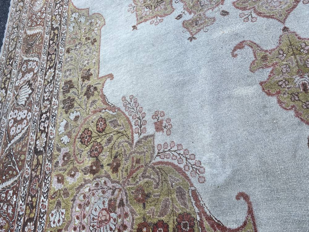 A large Persian rug, - Image 20 of 46