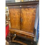 An 18th century Walnut Abanant cabinet on stand