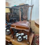 A set of four Chippendale style chairs