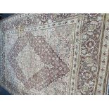 A large Persian rug, 418cms x 298cms,