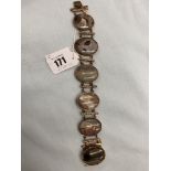 A bracelet (Gilt metal) set with six Agate stones