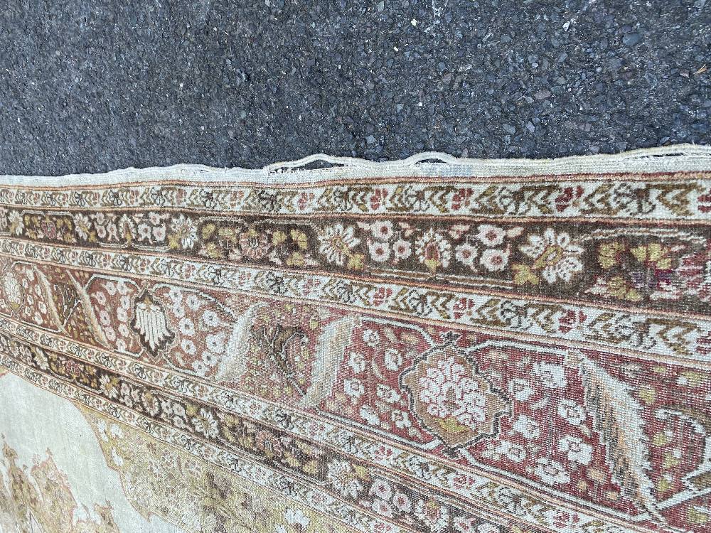 A large Persian rug, - Image 35 of 46