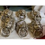 Six silvered Lions head door knockers