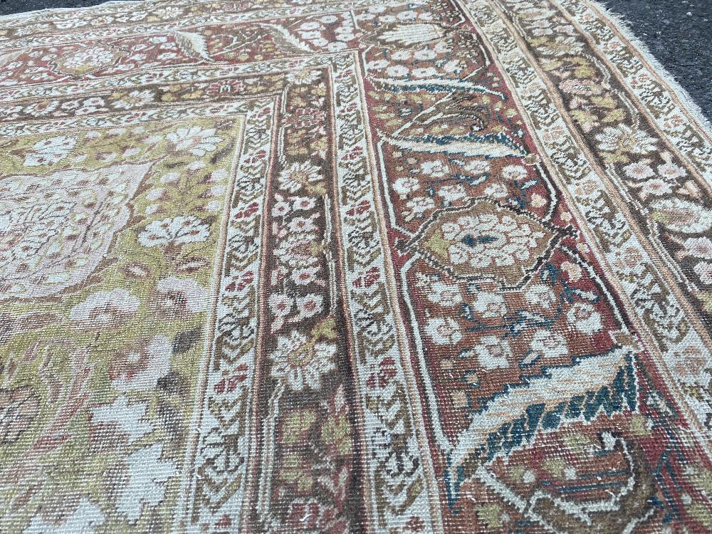 A large Persian rug, - Image 7 of 46