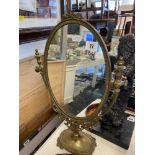 A brass mirror