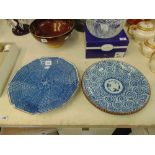 Two oriental blue and white chargers