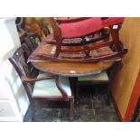 A Regency style dining room suite; table with extra leaf,