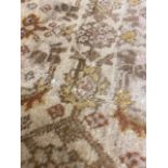 A large Brown Persian rug,