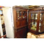 A Mahogany bookcase on cupboard base