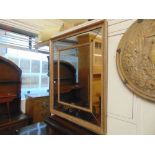 A large limed Oak sectioned mirror