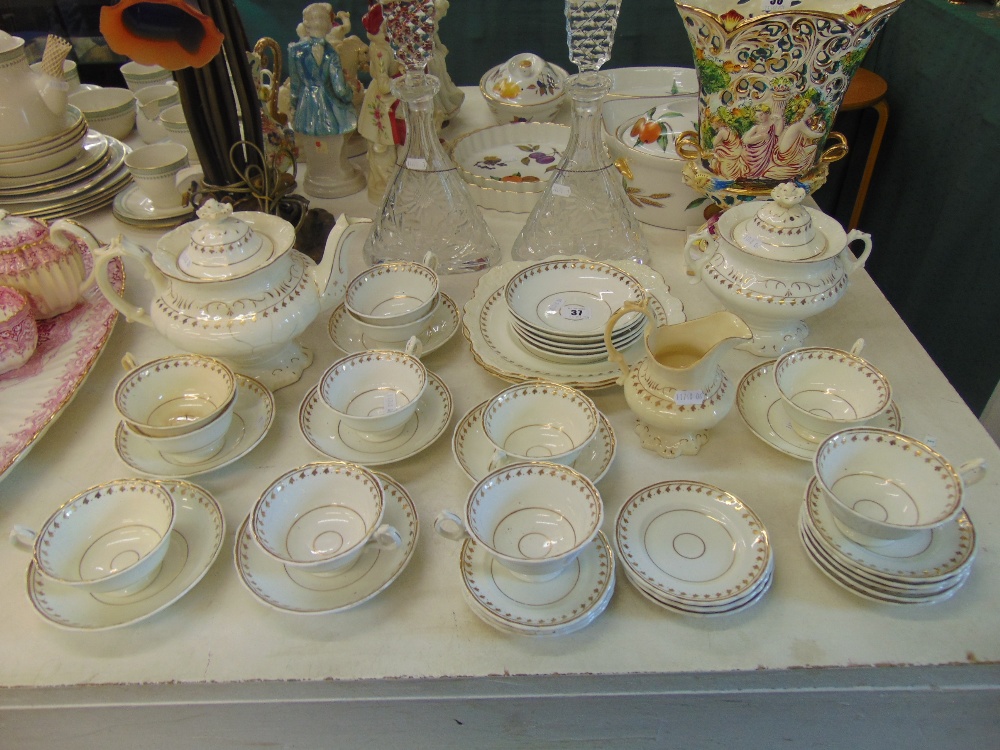 A GOld and white Victorian tea set inc.