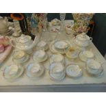 A GOld and white Victorian tea set inc.