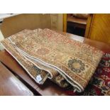 A brown ground Persian rug, 11.2 ft by 9.