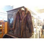 A fur stole and jacket,