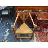 An Arts and Crafts Oak turners chair