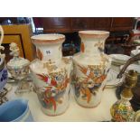 A pair of decorative Orange and White vases