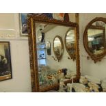 A large gilt wall mirror