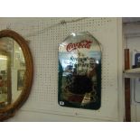 A Coca-cola advertising mirror wall clock,
