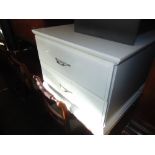 Two white two drawer chests