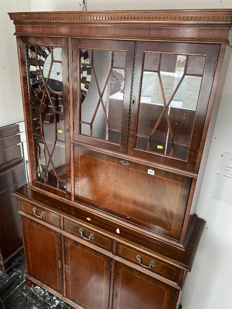 A Mahogany bookcase on cupboard base