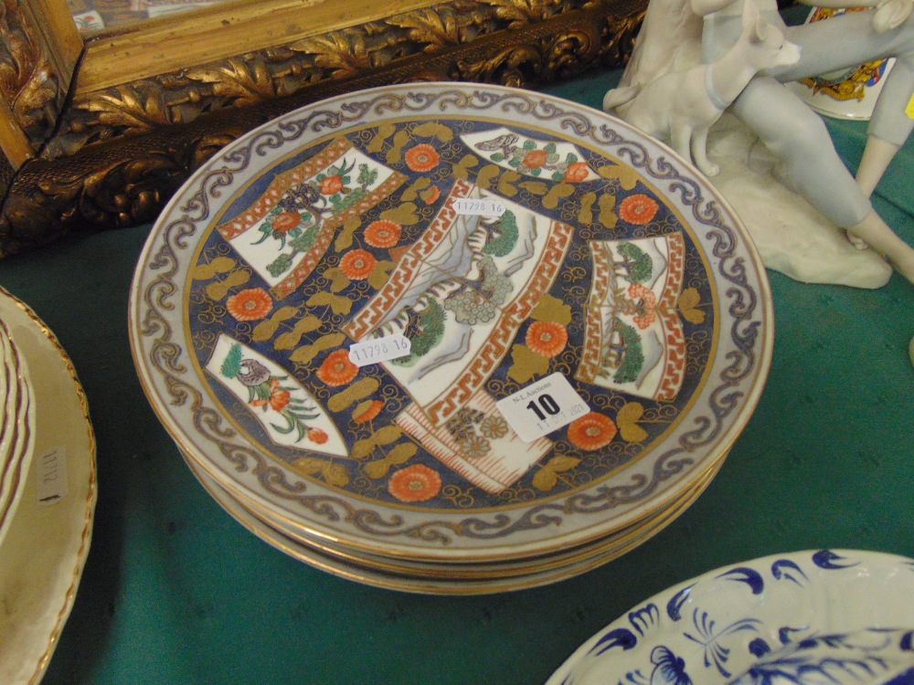 Four porcelain plates