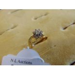 An 18ct Gold and Diamond dress ring,