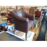 A leather tub chair a.