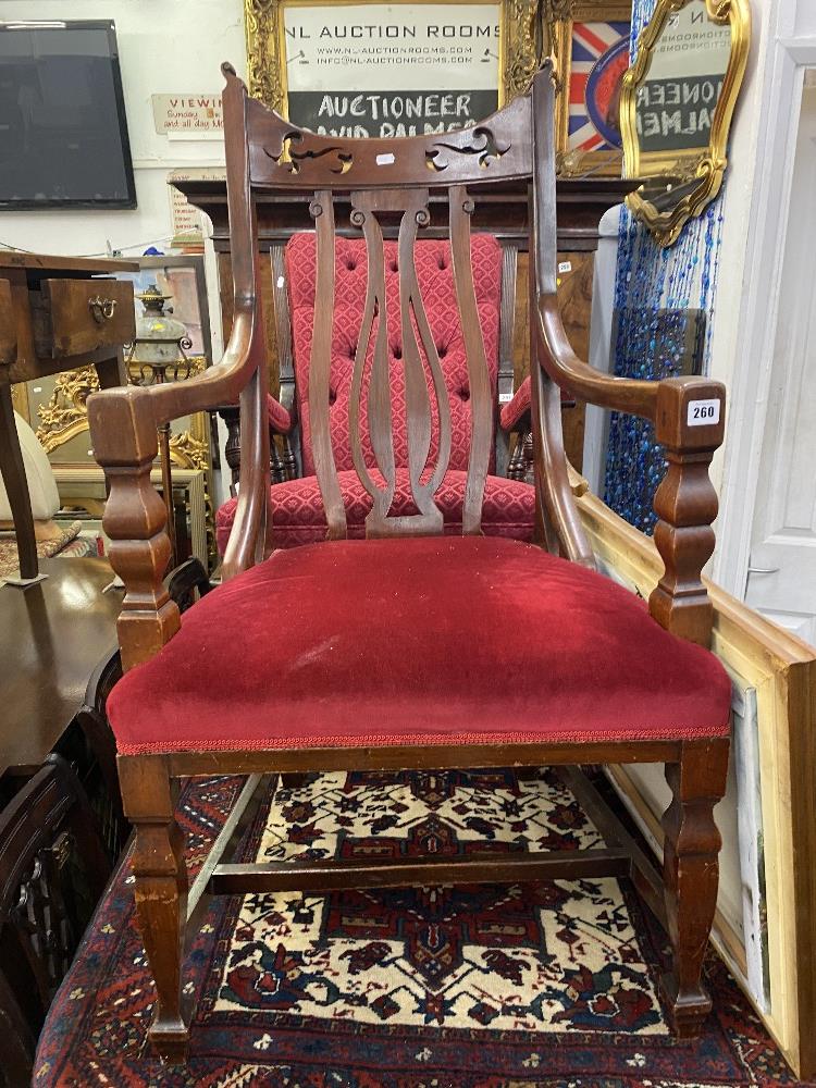 An upholstered Mahogany carver armchair