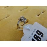 An 18ct gold and diamond ring