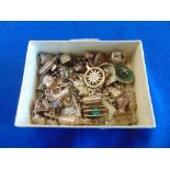 A large qty of hallmarked silver charms, 145 grams approx.