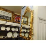 A gilt framed mirror