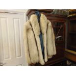 A ladies White Fox fur jacket,